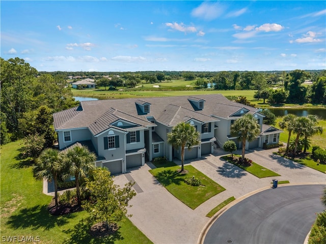 birds eye view of property featuring a water view