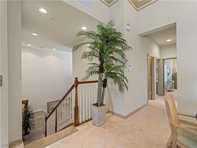 16521 Goldenrod Ln Unit 202, Alva, FL 33920 - hallway with an upstairs landing, recessed lighting, and light tile patterned floors