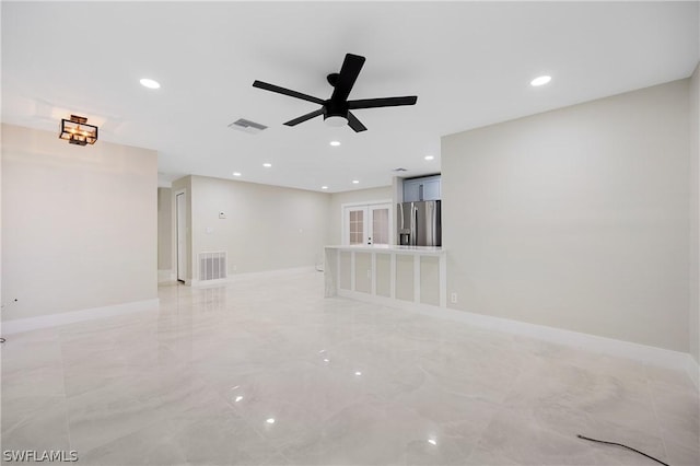 unfurnished living room with visible vents, ceiling fan, and recessed lighting