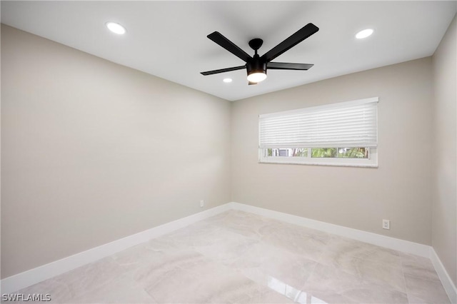 spare room with recessed lighting, baseboards, and ceiling fan