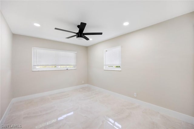 unfurnished room with baseboards, ceiling fan, and recessed lighting