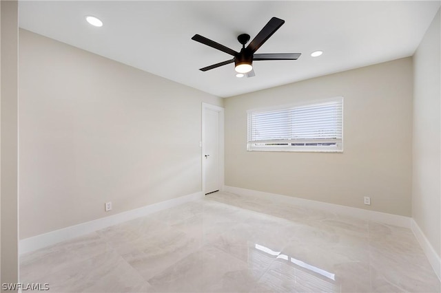 spare room with baseboards, ceiling fan, and recessed lighting