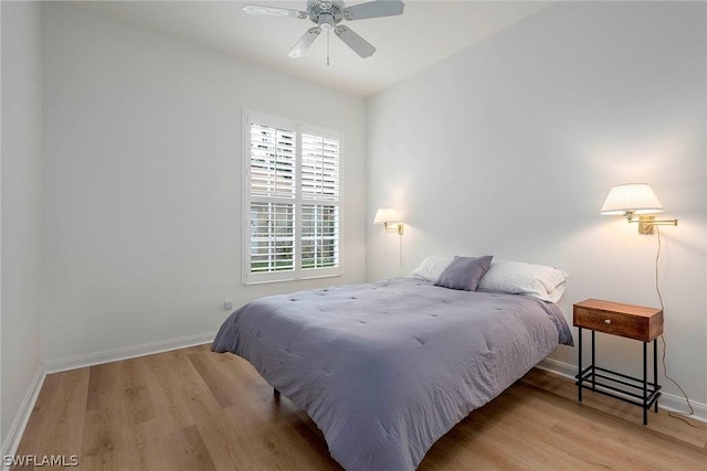 bedroom featuring ceiling fan and light wood-type flooring