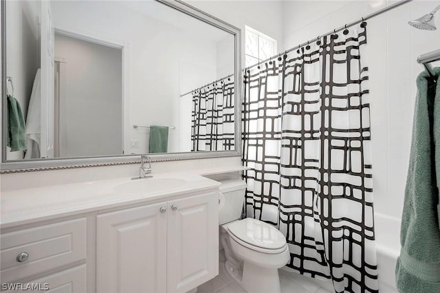 full bathroom featuring tile patterned flooring, vanity, shower / bath combination with curtain, and toilet