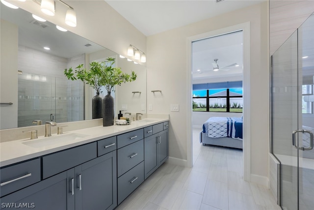 bathroom with walk in shower, tile patterned flooring, vanity, and ceiling fan