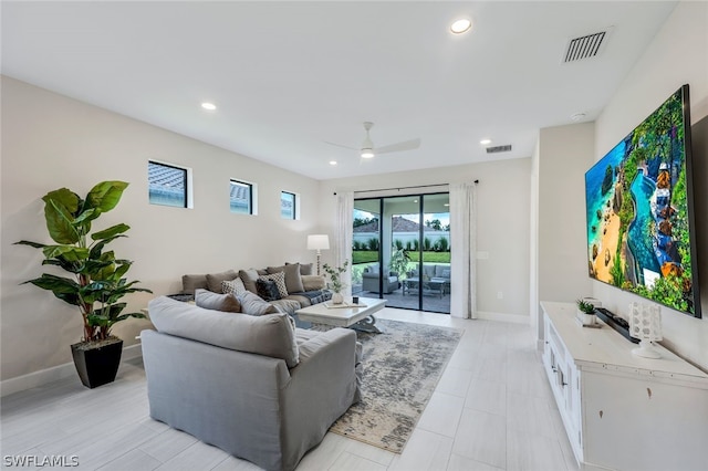 living room featuring ceiling fan