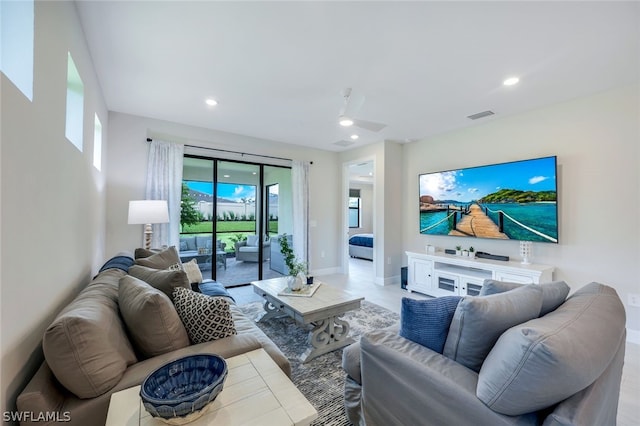 living room featuring ceiling fan