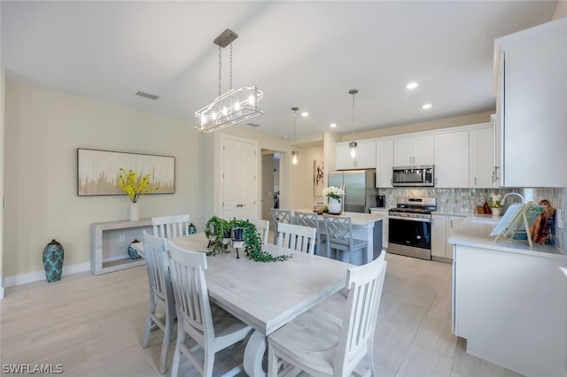 dining area featuring sink