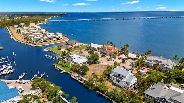 bird's eye view with a water view