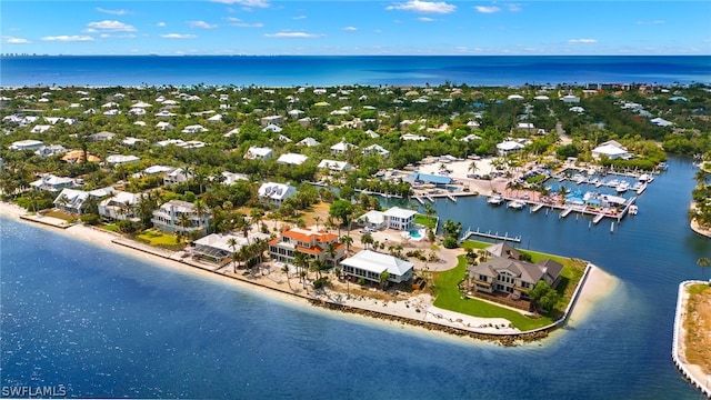 aerial view featuring a water view and a beach view