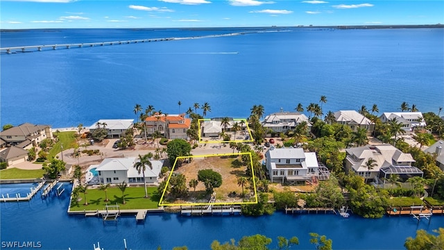 drone / aerial view featuring a water view