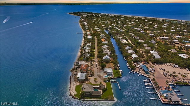 aerial view at dusk with a water view