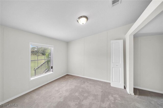 empty room with carpet floors