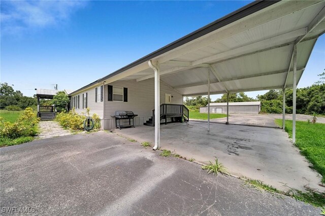 view of parking with a carport