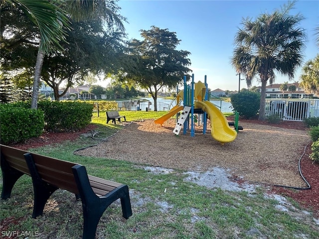 view of play area with a water view