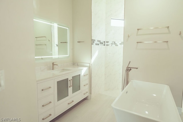 bathroom with tile floors and vanity with extensive cabinet space