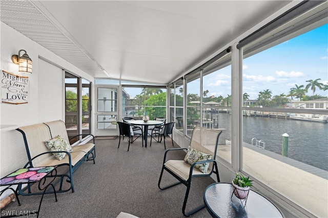 sunroom with a water view