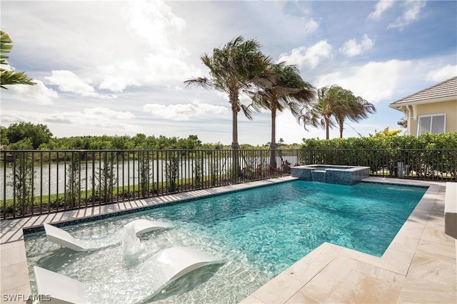 view of swimming pool featuring an in ground hot tub