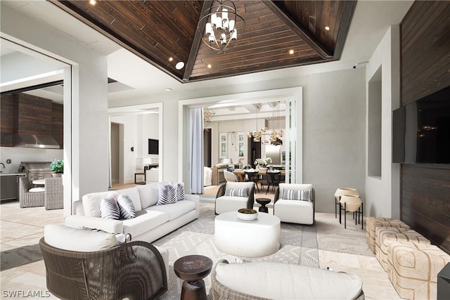 living room featuring vaulted ceiling, wood ceiling, and an inviting chandelier