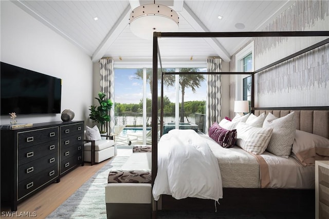 bedroom with wood-type flooring, vaulted ceiling with beams, access to outside, and multiple windows