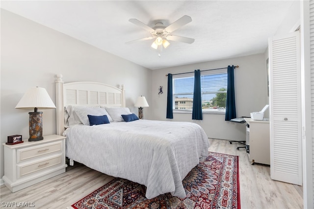 bedroom featuring ceiling fan and light hardwood / wood-style floors