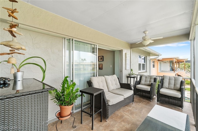 view of patio / terrace featuring ceiling fan and an outdoor hangout area