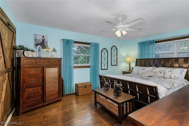 bedroom featuring a closet, ceiling fan, and dark hardwood / wood-style flooring