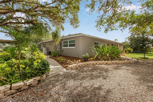 view of front of home featuring central AC unit