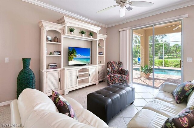 living room with light tile patterned floors, ceiling fan, and crown molding