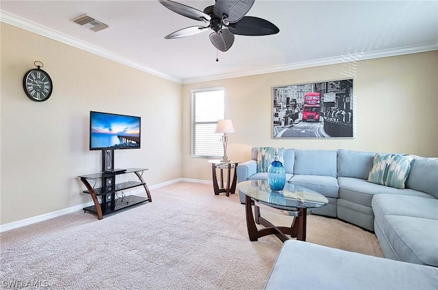 carpeted living room with ceiling fan and crown molding