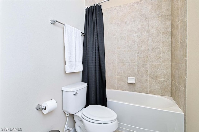 bathroom with toilet and shower / tub combo with curtain