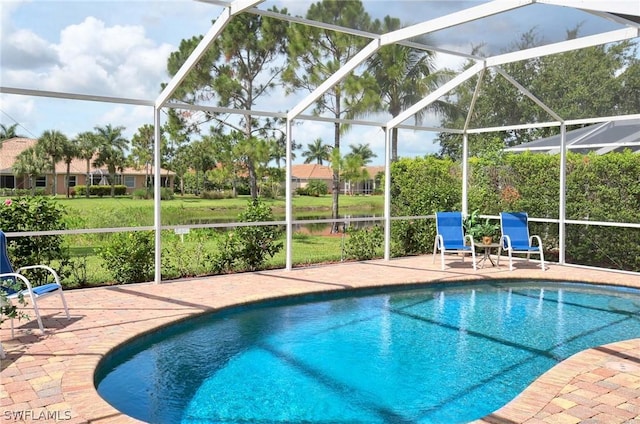 view of swimming pool featuring a lanai, a water view, and a patio