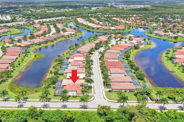 drone / aerial view featuring a water view