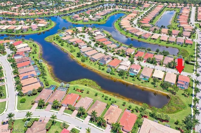 birds eye view of property featuring a water view