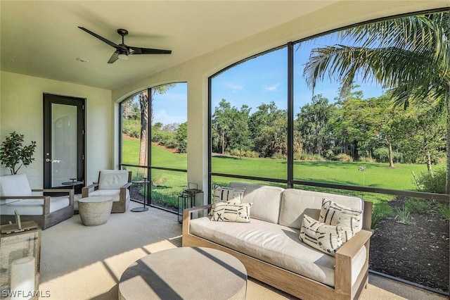 sunroom / solarium with ceiling fan