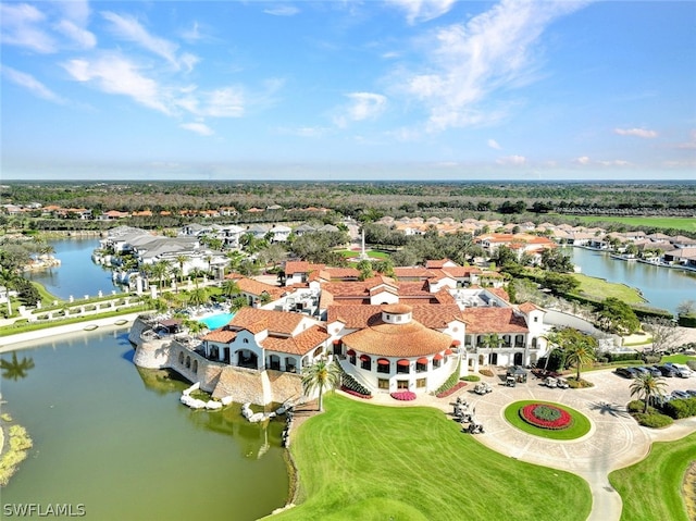 drone / aerial view with a water view