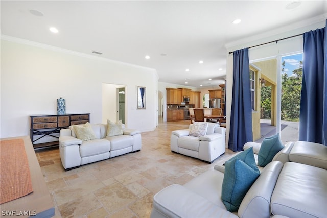 living room featuring crown molding