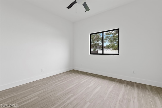 unfurnished room with light hardwood / wood-style floors and ceiling fan