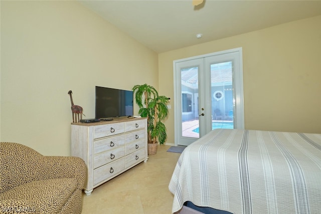 bedroom with french doors, multiple windows, and access to outside