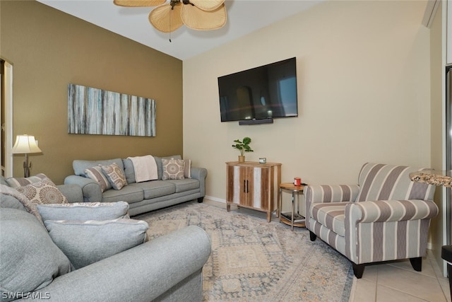 living room with ceiling fan and light tile patterned floors