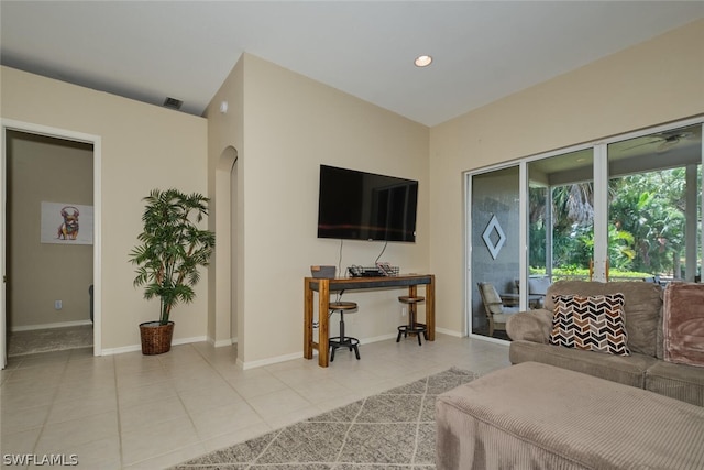 living room with light tile patterned floors