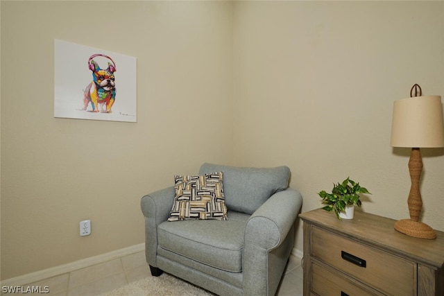 living area featuring light tile patterned floors