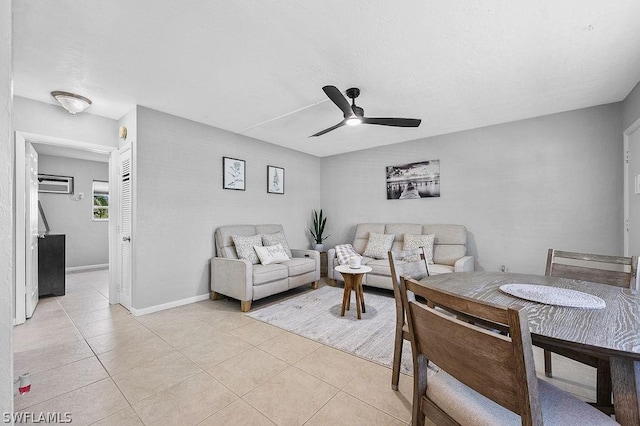 living room featuring ceiling fan and light tile patterned floors