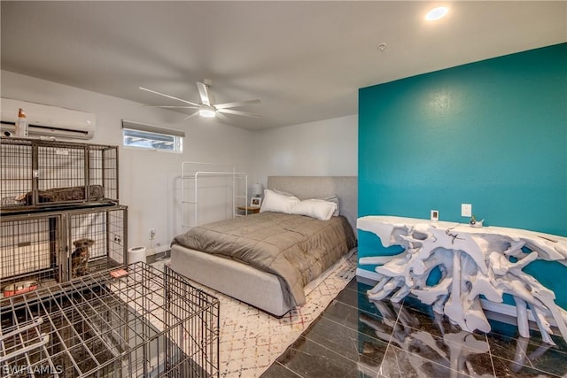 tiled bedroom with a wall unit AC and ceiling fan