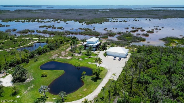 drone / aerial view featuring a water view