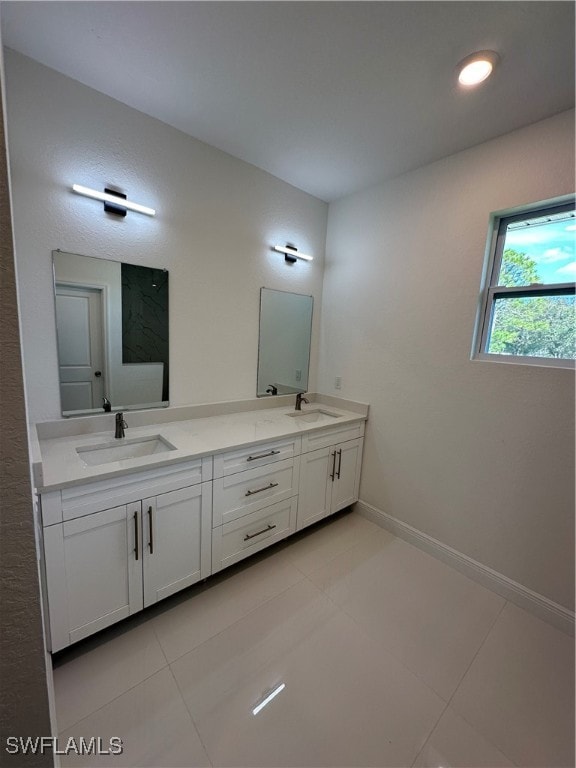 bathroom featuring vanity and tile patterned floors