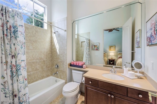 ensuite bathroom with toilet, shower / bathtub combination with curtain, ensuite bathroom, and vanity