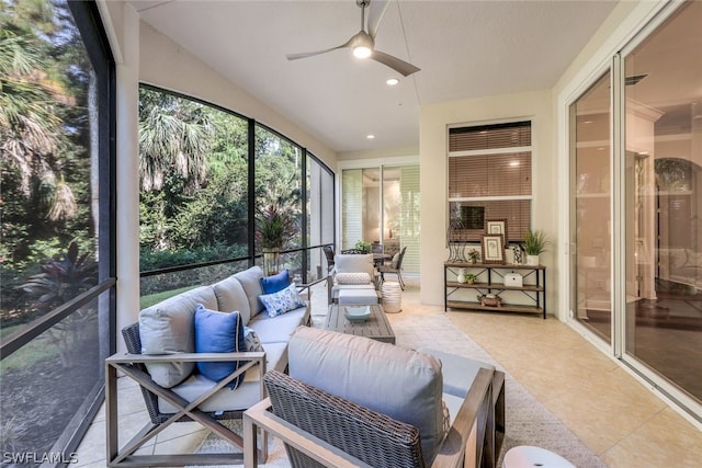 sunroom with ceiling fan