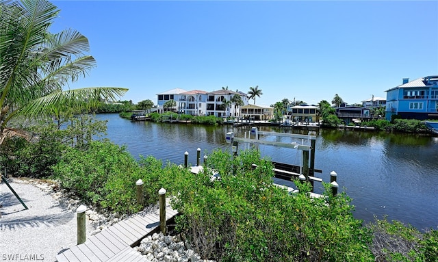 view of dock with a water view