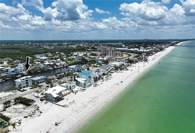 aerial view with a view of the beach and a water view